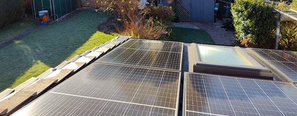 Viridian in-roof panels on a roof designed for them, complete with integrated Velux skylight